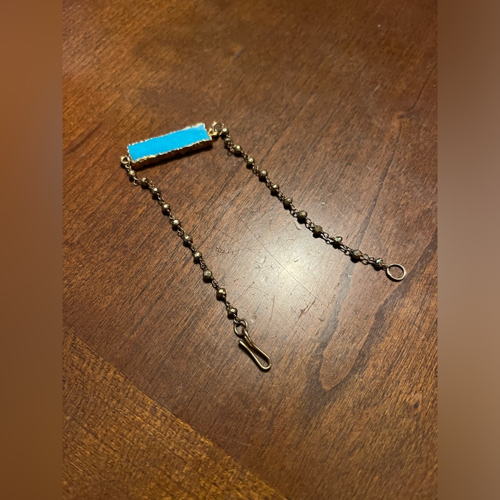 Turquoise and Gold coloured bracelet